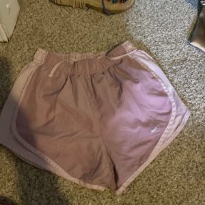 Nike rose gold athletic shorts